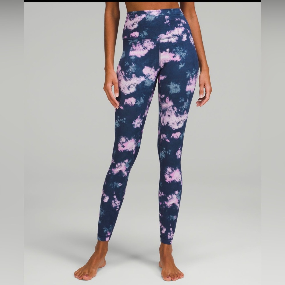 Lululemon high rise leggings in size 8. Buttery soft with tag unattached.